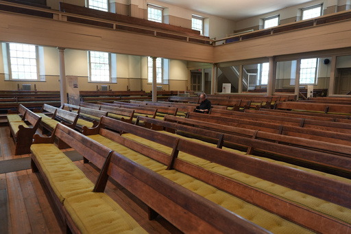 Jeffrey Kippax sits alone as he reads a text in preparation for upcoming Sunday worship in the historic West Room of the Arch Street Meeting House in Philadelphia on Oct. 5, 2025. (AP Photo/Luis Andres Henao) Jeffrey Kippax sits alone as he reads a text in preparation for upcoming Sunday worship in the historic West Room of the Arch Street Meeting House in Philadelphia on Oct. 5, 2025. (AP Photo/Luis Andres Henao)