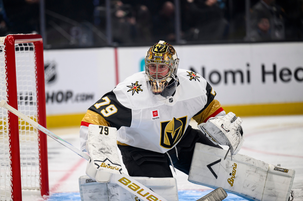Vegas Golden Knights goaltender Carter Hart protects the net during the first period of Game 4 of a first-round NHL hockey Stanley Cup playoff series against the Utah Mammoth, Monday, April 27, 2026, in Salt Lake City. (AP Photo/Tyler Tate)