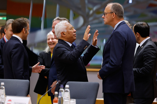 European Council President Antonio Costa, center, speaks with Germany's Chancellor Friedrich Merz, center right, during a round table meeting at an EU Summit in Brussels, Thursday, Oct. 23, 2025. (AP Photo/Geert Vanden Wijngaert) European Council President Antonio Costa, center, speaks with Germany's Chancellor Friedrich Merz, center right, during a round table meeting at an EU Summit in Brussels, Thursday, Oct. 23, 2025. (AP Photo/Geert Vanden Wijngaert)