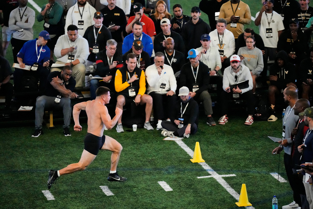 Vanderbilt quarterback Diego Pavia runs a 40-yard dash during the school's NFL football pro day Friday, March 20, 2026, in Nashville, Tenn. (AP Photo/George Walker IV)