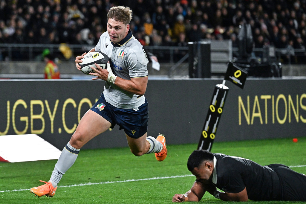 Leonardo Marin of Italy runs in to score a try during the Nations Championship rugby international between the All Blacks and Italy in Wellington, New Zealand, Saturday, July 11, 2026. (Masanori Udagawa/Photosport via AP)