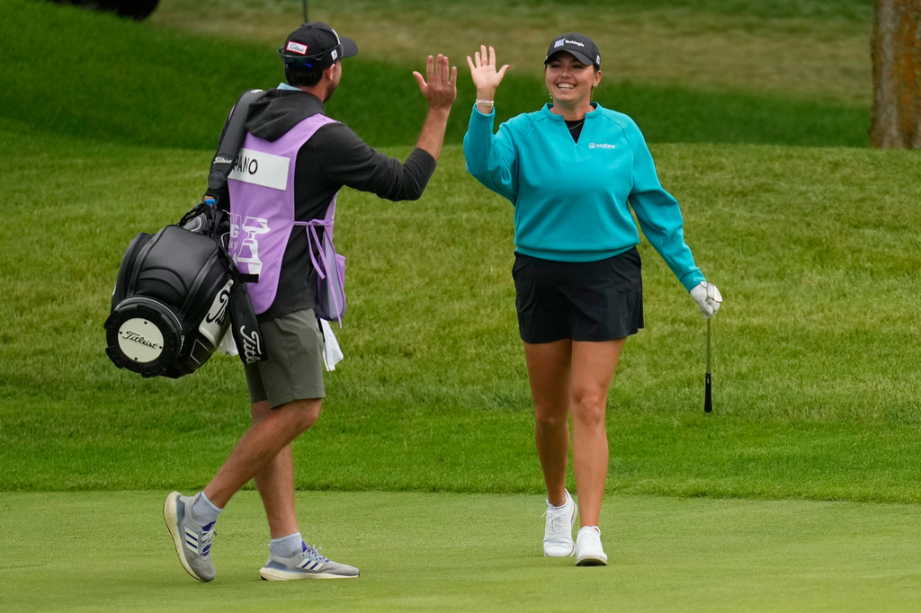 Alexa Pano reacts after an eagle on the 11th hole during the first round of the Women's PGA Championship golf tournament, Thursday, June 25, 2026, in Chaska, Minn. (AP Photo/Matt York)