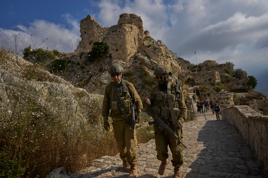 Israeli soldiers walk at the entrance to Beaufort Castle in southern Lebanon, Thursday, July 9, 2026. The Israeli military invited reporters on a tour of the strategic mountain topped by the Crusader-built castle months after launching a ground invasion that captured dozens of Lebanese villages and towns in southern Lebanon. (AP Photo/Ohad Zwigenberg)