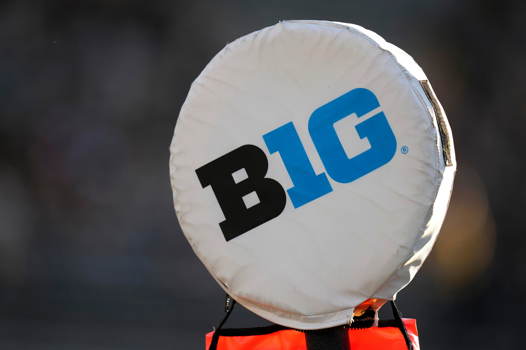 FILE - The Big Ten Conference logo sits atop a down marker during the first half of an NCAA college football game between Iowa and Michigan State, Sept. 30, 2023, in Iowa City, Iowa. (AP Photo/Charlie Neibergall, File)