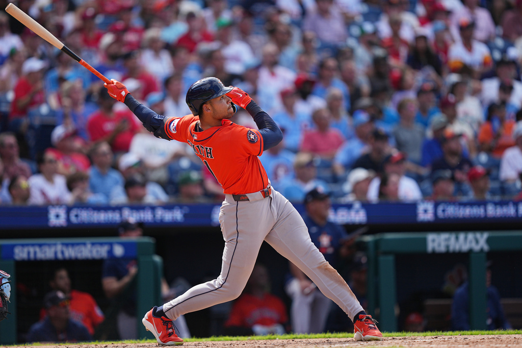 Houston Astros' Cam Smith follows through after hitting a home run off of Philadelphia Phillies pitcher Jhoan Duran during the ninth inning of a baseball game, Thursday, Sept. 10, 2026, in Philadelphia. (AP Photo/Matt Rourke)