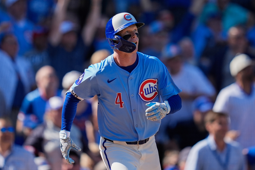 Chicago Cubs' Pete Crow-Armstrong (4) runs the bases after hitting a two-run home run, making Cubs history with 30 home runs and 30 stolen bases in a season, during the fourth inning of a baseball game against the St. Louis Cardinals, Friday, Sept. 26, 2025, in Chicago. (AP Photo/Erin Hooley)