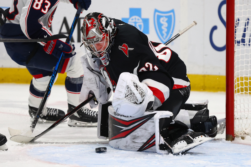 Buffalo Sabres goaltender Colten Ellis (92) makes a save during the second period of an NHL hockey game against the Columbus Blue Jackets, Thursday, April 9, 2026, in Buffalo, N.Y. (AP Photo/Jeffrey T. Barnes)