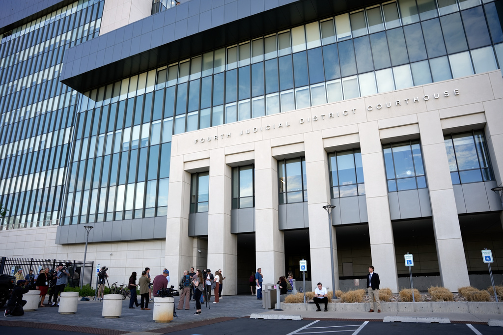 Media reporters wait outside the Fourth District Courthouse, ahead of a hearing for Tyler Robinson, accused in the fatal shooting of Charlie Kirk, Monday, July 6, 2026, in Provo, Utah. (AP Photo/Marielle Scott)
