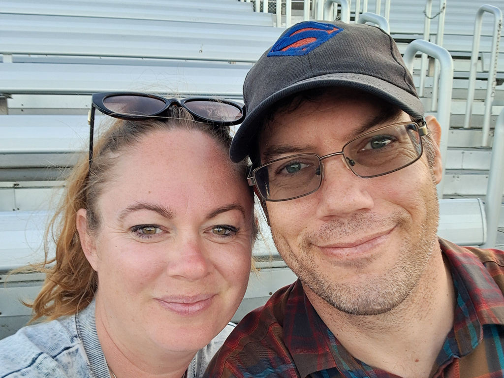 This undated photo provided by Rebecca Rischar on Wednesday, June 17, 2026, shows her, left, posing for a photo with her husband Christopher Rischar. (Rebecca Rischar via AP)