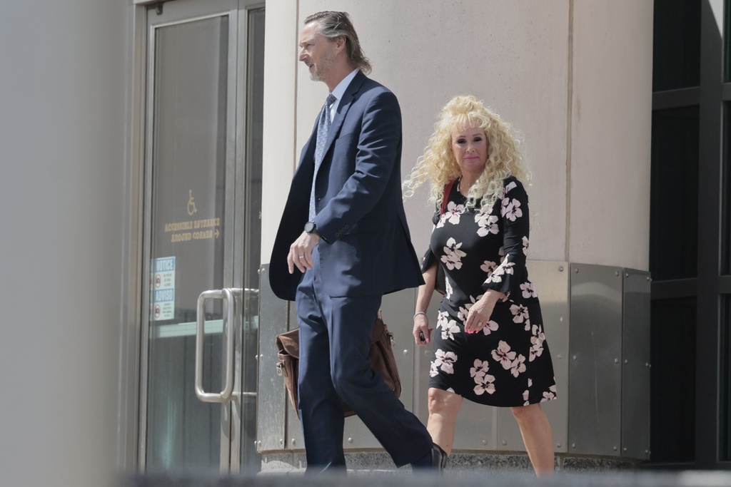 Tonia Haddix leaves the Thomas F. Eagleton U.S. Courthouse with her attorney Bill Margulis after entering guilty pleas to two counts of perjury and one count of obstruction of justice on March 31, 2025, in downtown St. Louis. (Laurie Skrivan/St. Louis Post-Dispatch via AP)
