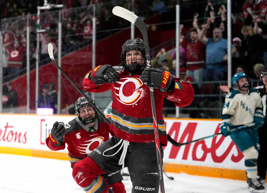 Ottawa Charge's Gabbie Hughes (17) reacts after scoring against the Seattle Torrent during third period PWHL hockey action in Ottawa, on Wednesday, April 8, 2026. (Justin Tang/The Canadian Press via AP)
