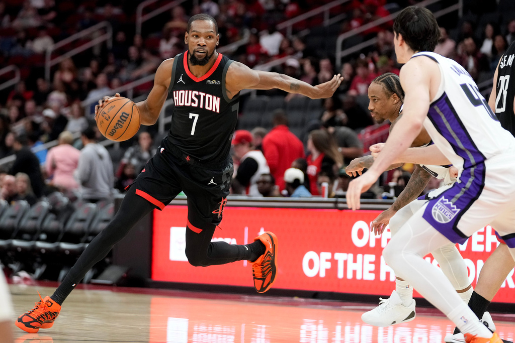 Houston Rockets forward Kevin Durant (7) dribbles against the Sacramento Kings during the second half of an NBA basketball game, Wednesday, Feb. 25, 2026, in Houston. (AP Photo/Eric Christian Smith)