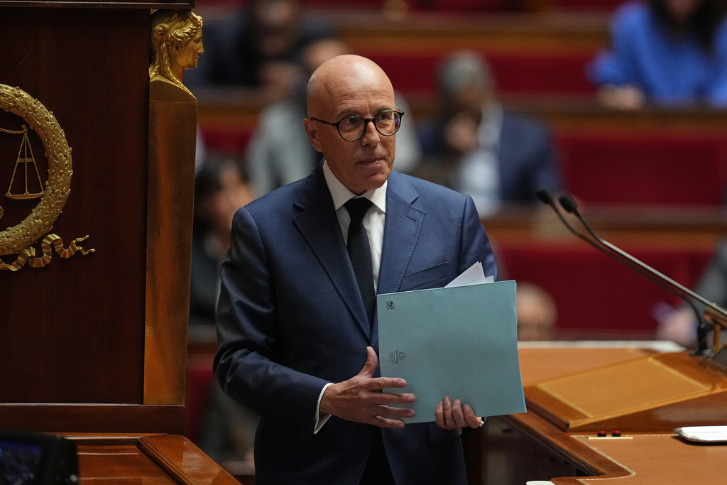 Eric Ciotti, a conservative lawmaker and ally to far-right National Rally party, leaves after his speech before a no-confidence vote, Thursday, Oct. 16, 2025 at the National Assembly in Paris. (AP Photo/Thibault Camus)
