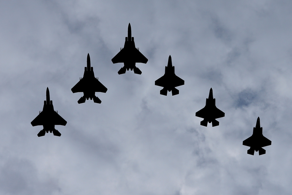 U.S. Air Force jets flyover downtown Washington as President Donald Trump host Saudi Arabia's Cronw Prince Mohammed bin Salman,Tuesday, Nov., 18, 2025. (AP Photo/Pablo Martinez Monsivais)