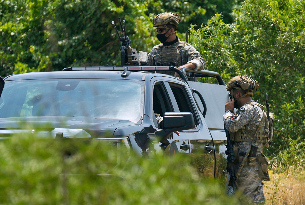 FILE - Forces of the regional Kurdish administration secure the area of the Jasana Cave ahead of a symbolic disarmament ceremony by the separatist PKK group as part of the peace process with Turkey, in Sulaymaniyah governorate, Iraq, July 11, 2025. (AP Photo/Hadi Mizban, File)