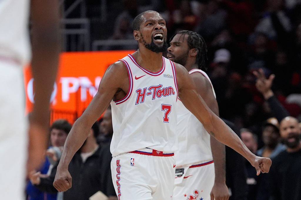 Houston Rockets forward Kevin Durant (7) reacts after scoring during the first half of an NBA basketball game against the San Antonio Spurs in Houston, Wednesday, Jan. 28, 2026. (AP Photo/Ashley Landis)