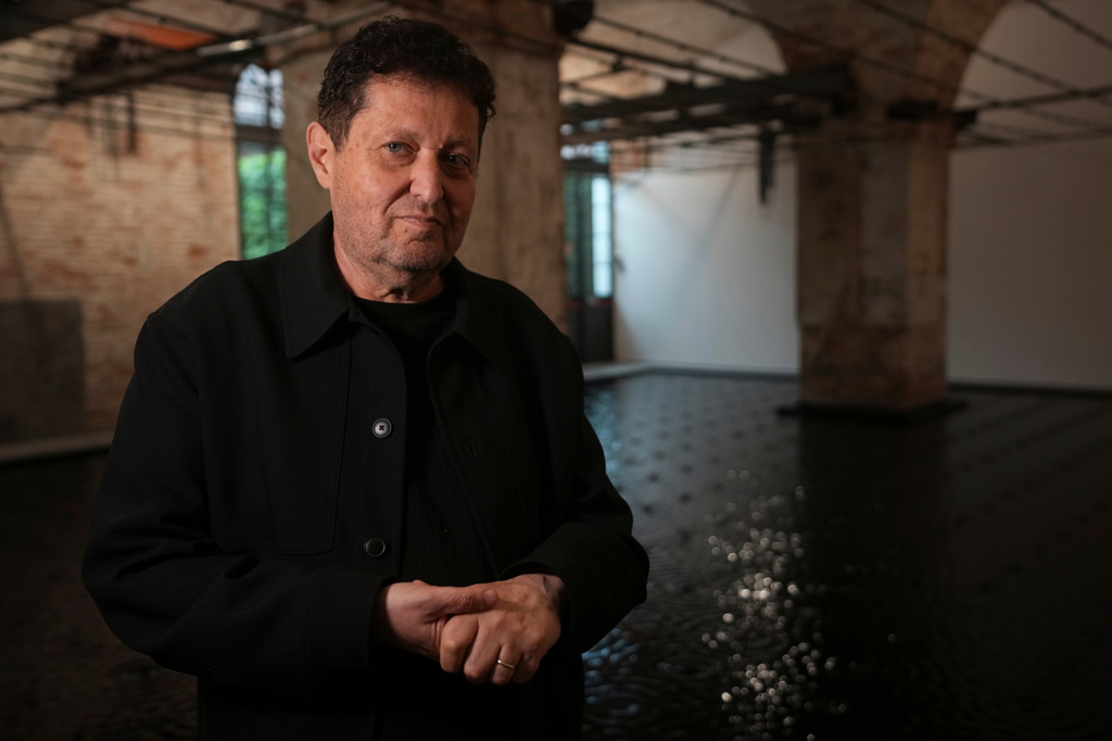 Artist Belu-Simion Fainaru poses inside the Israel pavilion at the Venice 2026 Biennale Art, in Venice, Italy, Tuesday, May 5, 2026. (AP Photo/Luca Bruno)