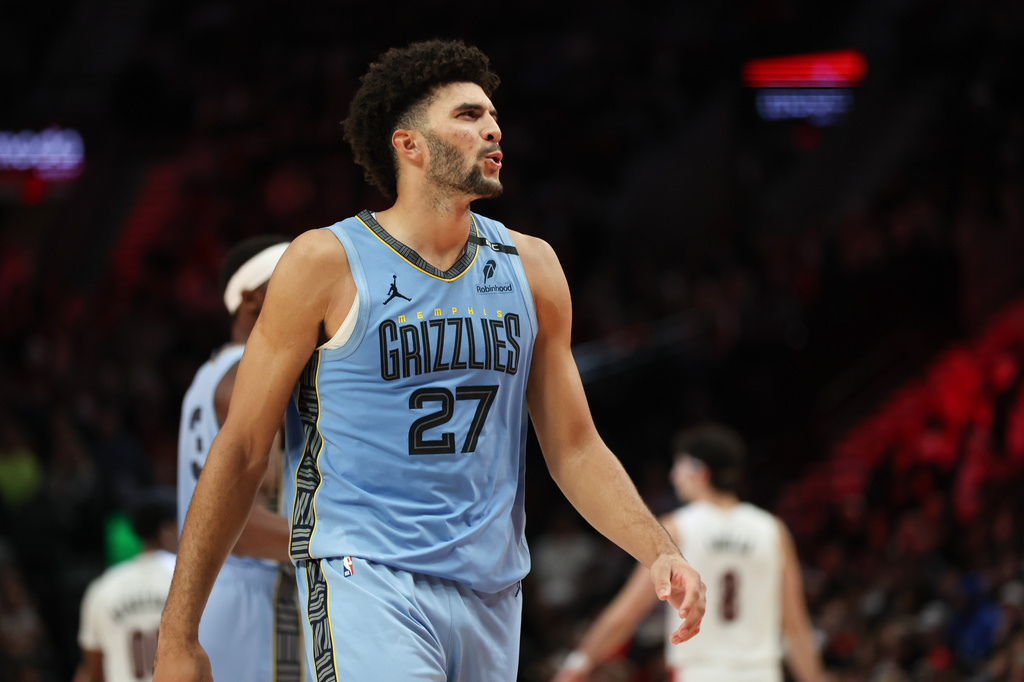 Memphis Grizzlies forward Cameron Boozer (27) reacts during the second half of an NBA basketball game against the Portland Trail Blazers Thursday, Oct. 29, 2026, in Portland, Ore. (AP Photo/Amanda Loman)