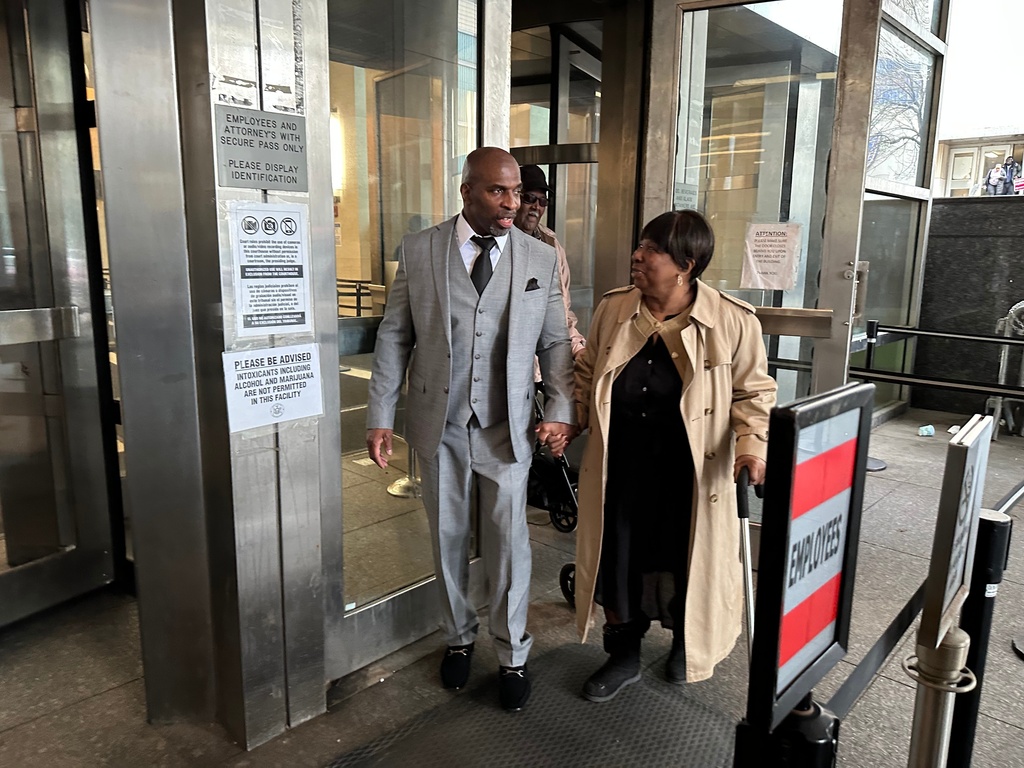 Kenneth Windley, left, leaves the courthouse with his mother, Francina Windley Patterson, in the Brooklyn borough of New York, Monday, March 16, 2026. (AP Photo/Jennifer Peltz)