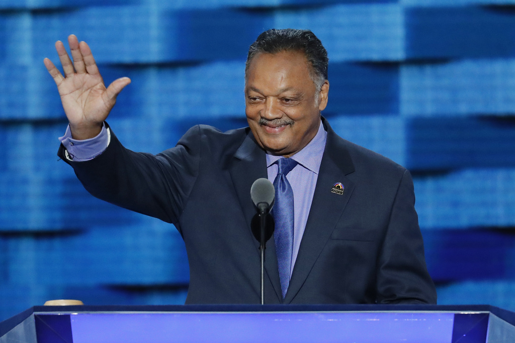 FILE - Rev. Jesse Jackson waves as he steps to the podium during the third day of the Democratic National Convention in Philadelphia, July 27, 2016. (AP Photo/J. Scott Applewhite)