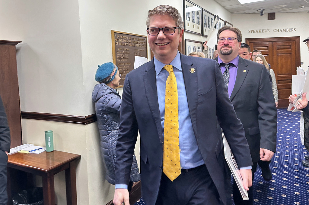 FILE - Alaska Republican U.S. Rep. Nick Begich walks down a corridor in the state Capitol before giving a speech to Alaska lawmakers, March 10, 2026, in Juneau, Alaska. (AP Photo/Becky Bohrer, File)