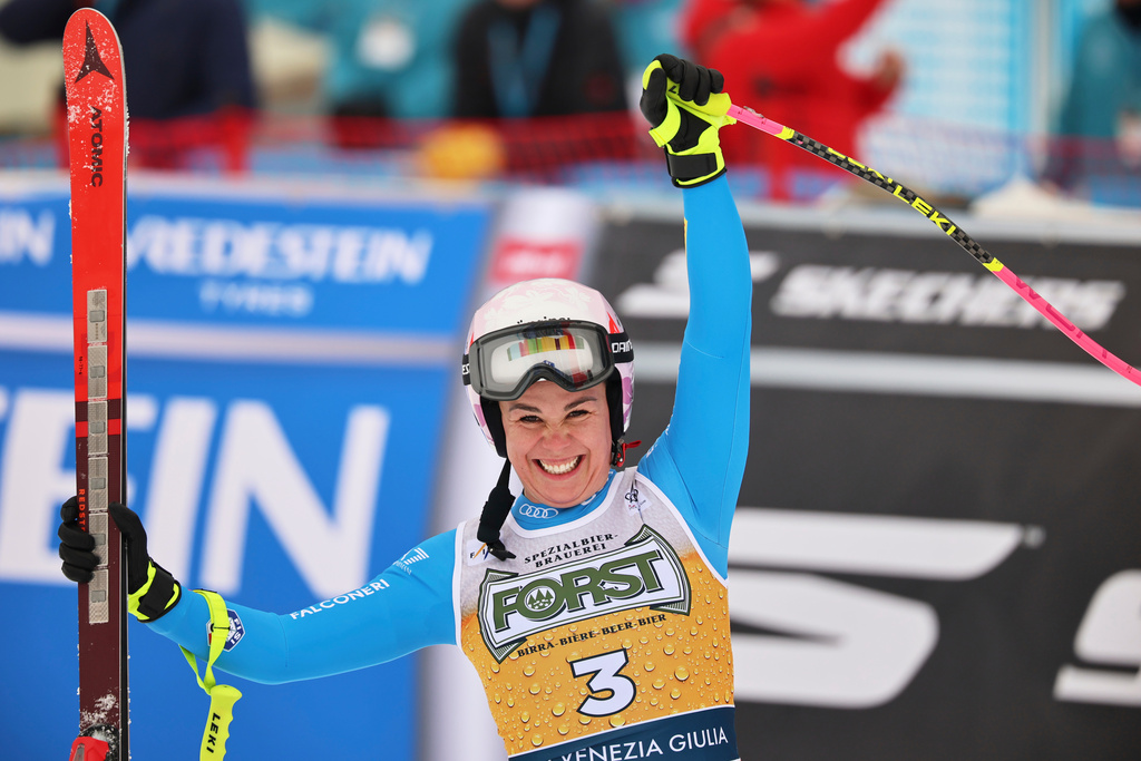 Italy's Nicol Delago celebrates at the finish area of an alpine ski, women's World Cup downhill, in Tarvisio, Italy, Saturday, Jan. 17, 2026. (AP Photo/Marco Trovati)