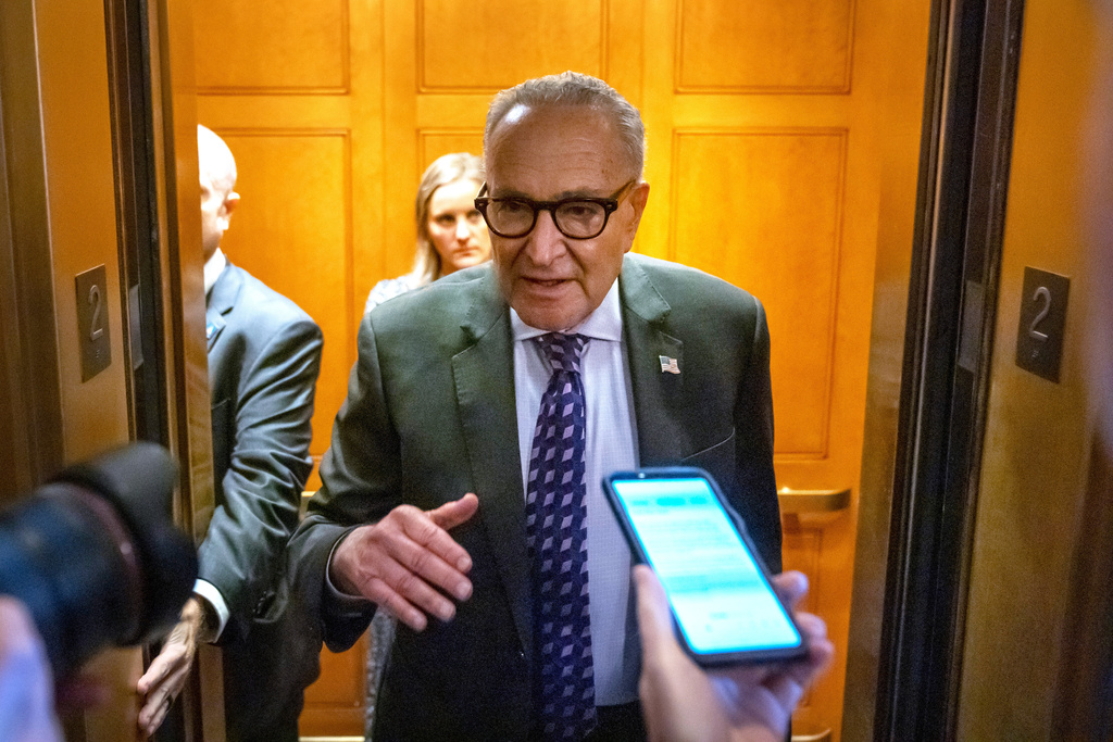 Senate Minority Leader Chuck Schumer, of N.Y., speaks to reporters at the Capitol on Wednesday, Oct. 1, 2025, in Washington. (AP Photo/Mark Schiefelbein)