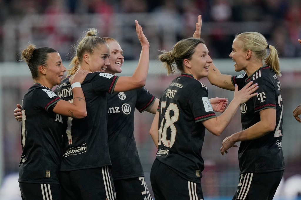 Bayern players celebrate their side's third goal during a German women's Bundesliga soccer match between 1.FC Union Berlin and Bayern Munich in Berlin, Germany, Wednesday, April 22, 2026. (AP Photo/Ebrahim Noroozi)
