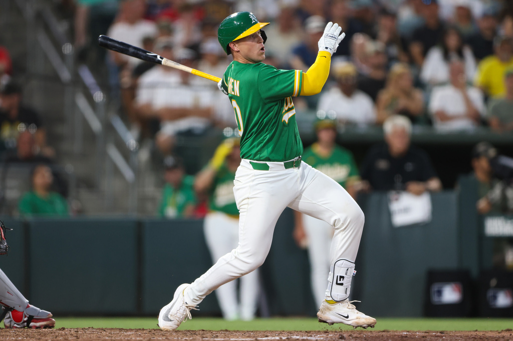 Athletics' Brian Serven hits a two-run home run during the seventh inning of a baseball game against the Boston Red Sox Tuesday, July 28, 2026, in West Sacramento, Calif. (AP Photo/Scott Marshall)