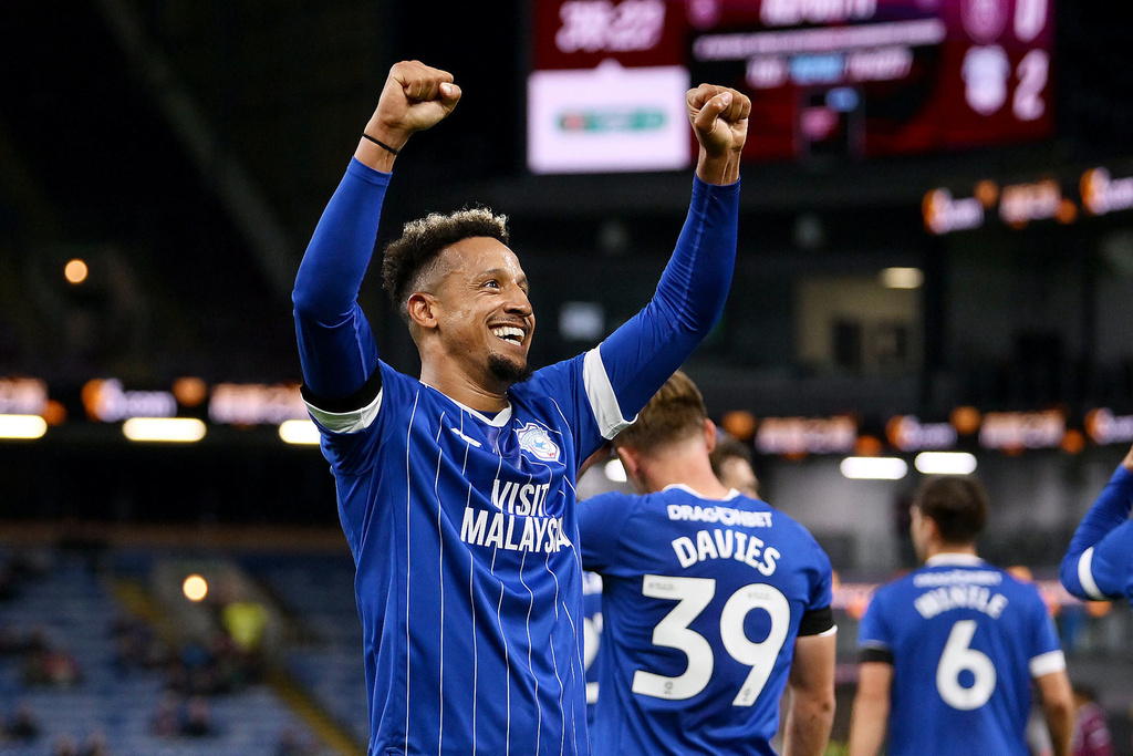 Cardiff City's Callum Robinson celebrates scoring during the English League Cup third round match between Burnley and Cardiff City at Turf Moor, Burnley, England, Tuesday Sept. 23, 2025. (Gary Oakley/PA via AP)