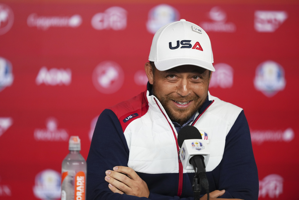 United States' Xander Schauffele speaks during a news conference before a practice round at the Ryder Cup golf tournament, Tuesday, Sept. 23, 2025, in Farmingdale, N.Y., at Bethpage State Park's Black Course between the United States and Europe. (AP Photo/Linsey Wasson)