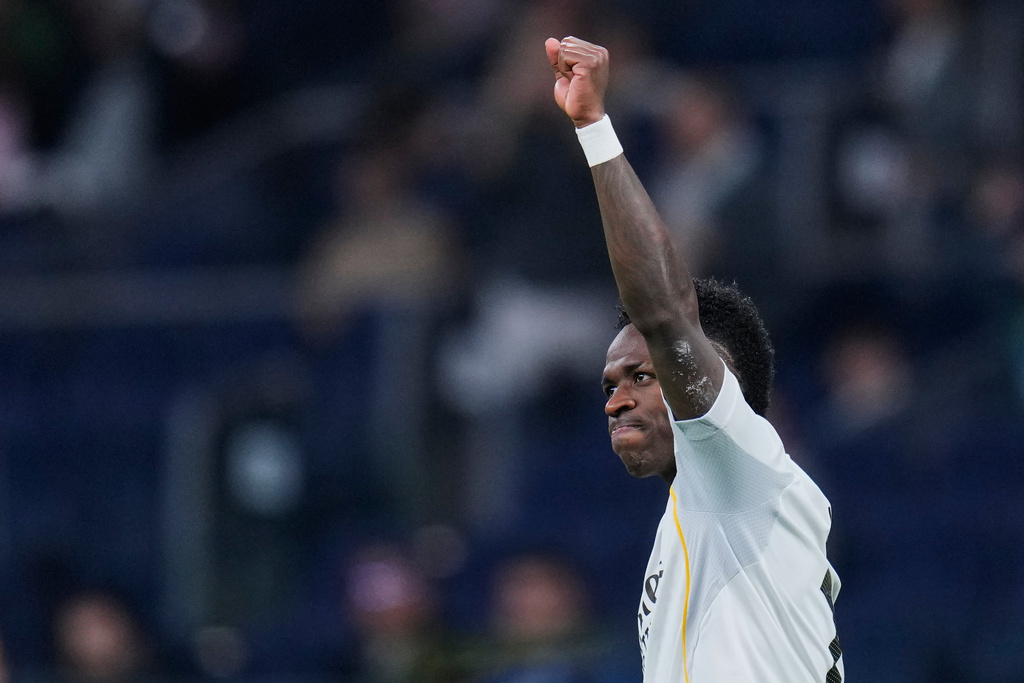 Real Madrid's Vinicius Junior celebrates scoring his side's 4th goal from the penalty spot during the Spanish La Liga soccer match between Real Madrid and Real Sociedad in Madrid, Spain, Saturday, Feb. 14, 2026. (AP Photo/Manu Fernandez)