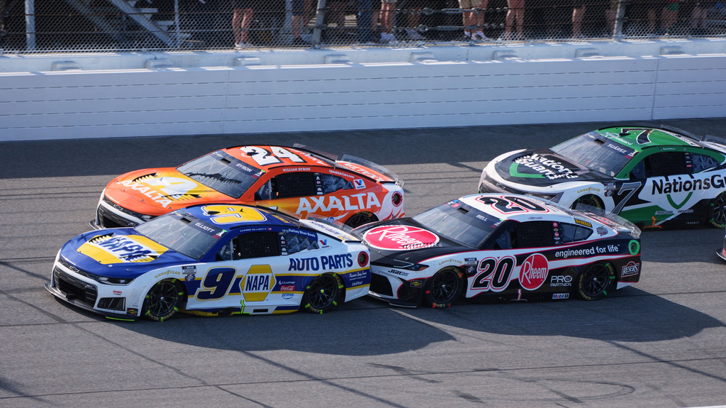 Chase Elliott (9), William Byron (24), Christopher Bell (20) and Daniel Suarez (7) battle for position during a NASCAR Cup Series auto race at Michigan International Speedway in Brooklyn, Mich., Sunday, June 7, 2026. (AP Photo/Paul Sancya)