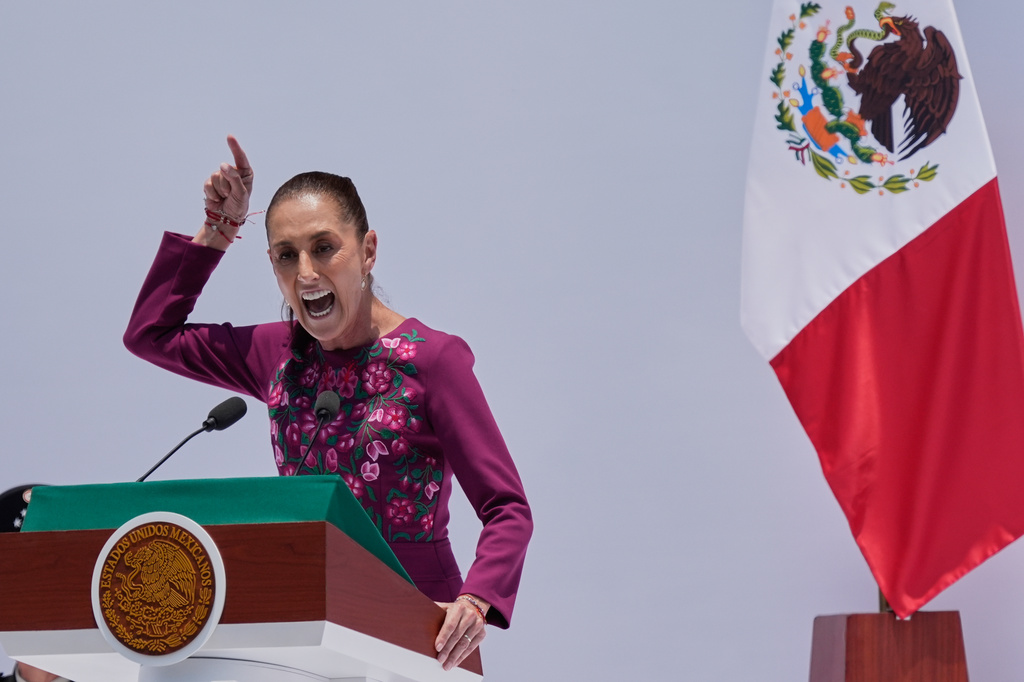 Mexican President Claudia Sheinbaum addresses supporters at the Monument to the Revolution in Mexico City, Sunday, May 31, 2026, marking two years in power. (AP Photo/Marco Ugarte)