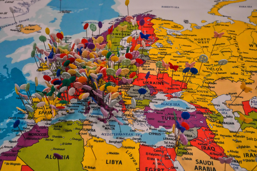 Pins placed by visitors on a map at a Twistee Treat Diner in Livingston, Ill, Thursday, Nov. 20, 2025. (AP Photo/Jeff Roberson)