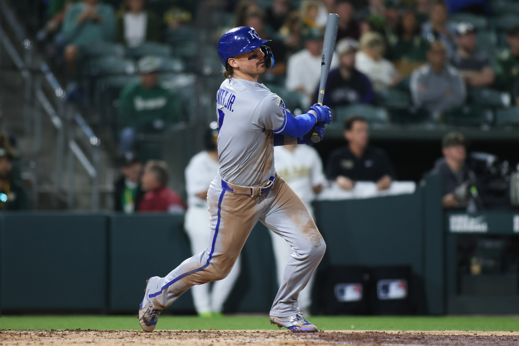 Kansas City Royals' Bobby Witt Jr. hits a three run home run during the 10th inning of a baseball game against the Athletics, Tuesday, April 28, 2026, in West Sacramento, Calif. (AP Photo/Scott Marshall)