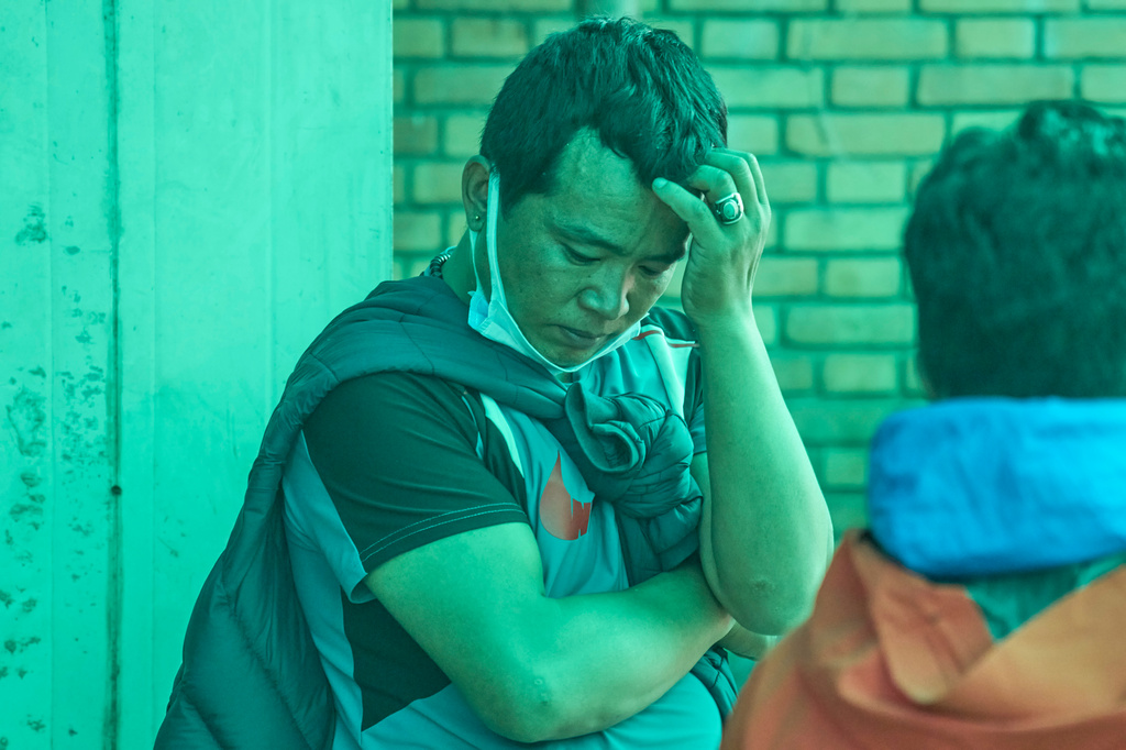 A brother of a Nepali climber mourns as the bodies of Nepali climbers recovered after an avalanche on Mount Himlung lie at the morgue of a hospital in Kathmandu, Nepal, Monday, Sept. 28, 2026. (AP Photo/Niranjan Shrestha)