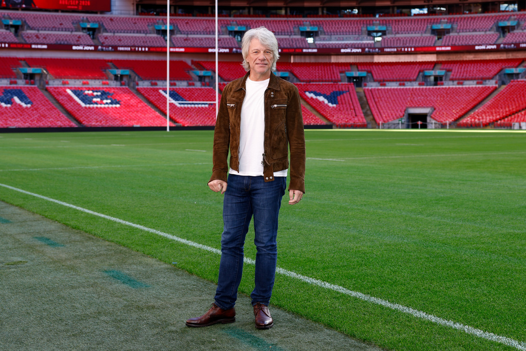 Jon Bon Jovi poses for photographers after announcing an upcoming tour and reimagined album 'Forever: Legendary Edition' during a press conference at Wembley Stadium on Friday, Oct. 24, 2025, in London. (Photo by Millie Turner/Invision/AP)