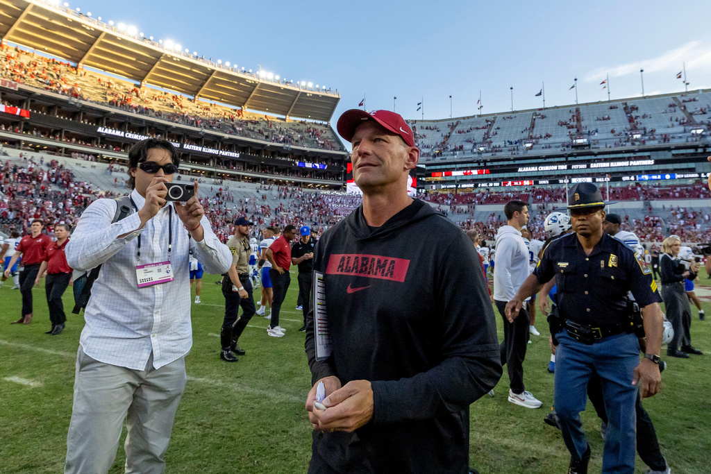 Alabama head coach Kalen DeBoer walks off the field after a 56-0 win over Eastern Illinois at an NCAA college football game, Saturday, Nov. 22, 2025, in Tuscaloosa, Ala. (AP Photo/Vasha Hunt)