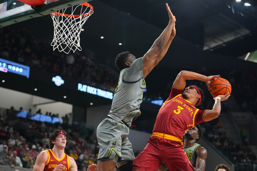 Iowa State guard Tamin Lipsey (3) goes up for a shot against Baylor center Jame Nnaji during the first half of an NCAA college basketball game Wednesday, Jan. 7, 2026, in Waco, Texas. (AP Photo/Julio Cortez)