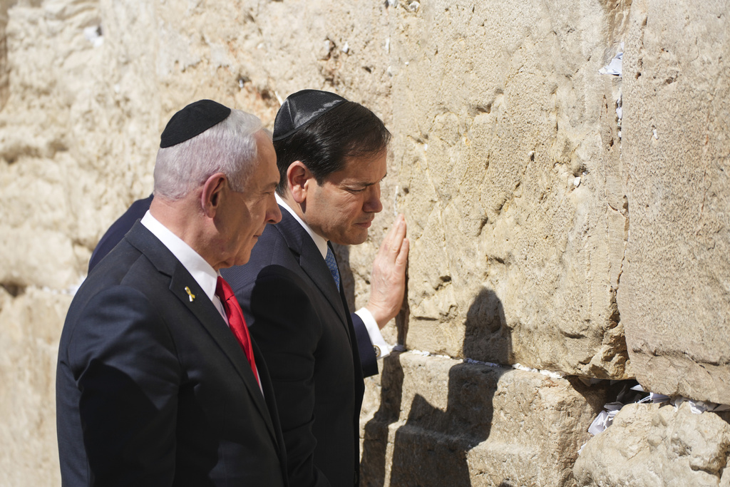 Israeli Prime Minister Benjamin Netanyahu, left, and U.S. Secretary of State Marco Rubio visit the Western Wall, the holiest site where Jews can pray, in the Old City of Jerusalem Sunday, Sept. 14, 2025. (AP Photo/Ariel Schalit)
