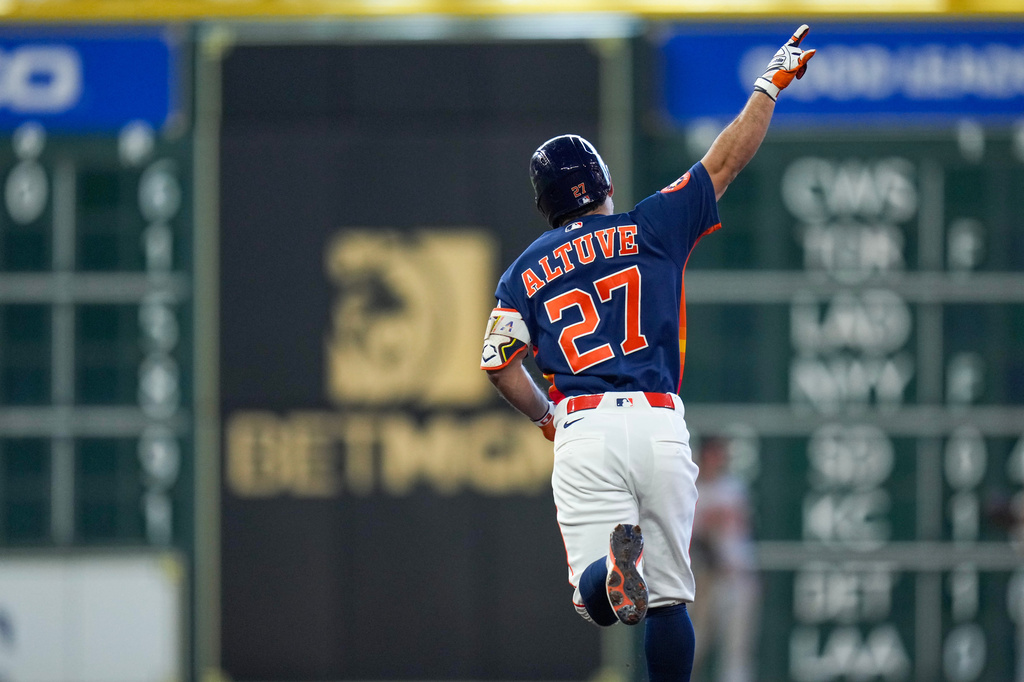 Houston Astros' Jose Altuve reacts after hitting a solo home run against the Baltimore Orioles during the eighth inning of a baseball game Sunday, July 19, 2026, in Houston. (AP Photo/Eric Christian Smith)