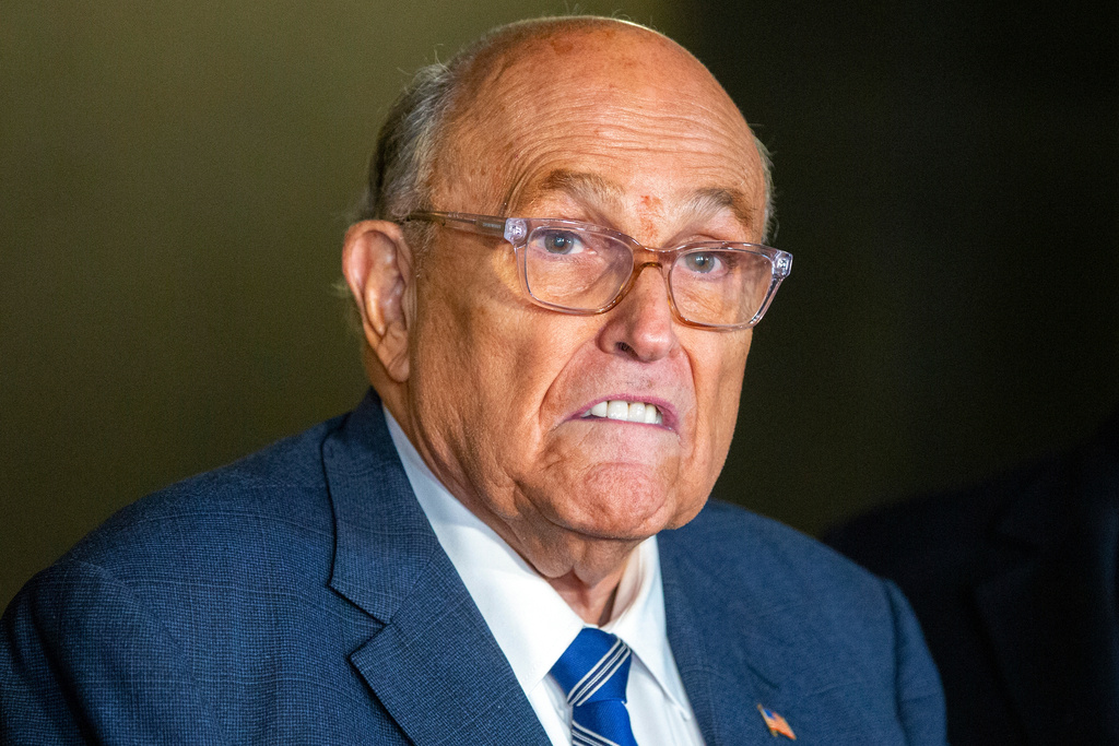 FILE - Rudy Giuliani speaks to the media outside Manhattan federal court in New York, Jan. 3, 2025. (AP Photo/Ted Shaffrey, File)