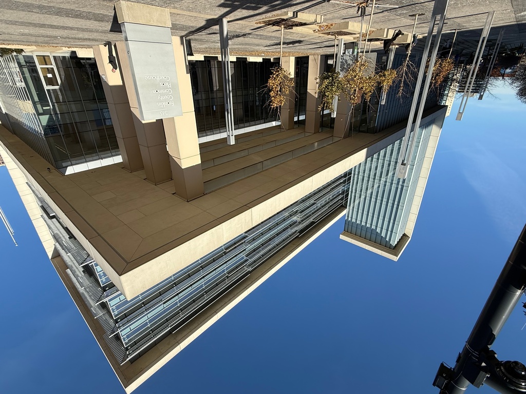 A person stands outside of the Franklin County Common Pleas Courthouse on Thursday, Nov. 13, 2025, in Columbus, Ohio. (AP Photo/Patrick Aftoora-Orsagos)