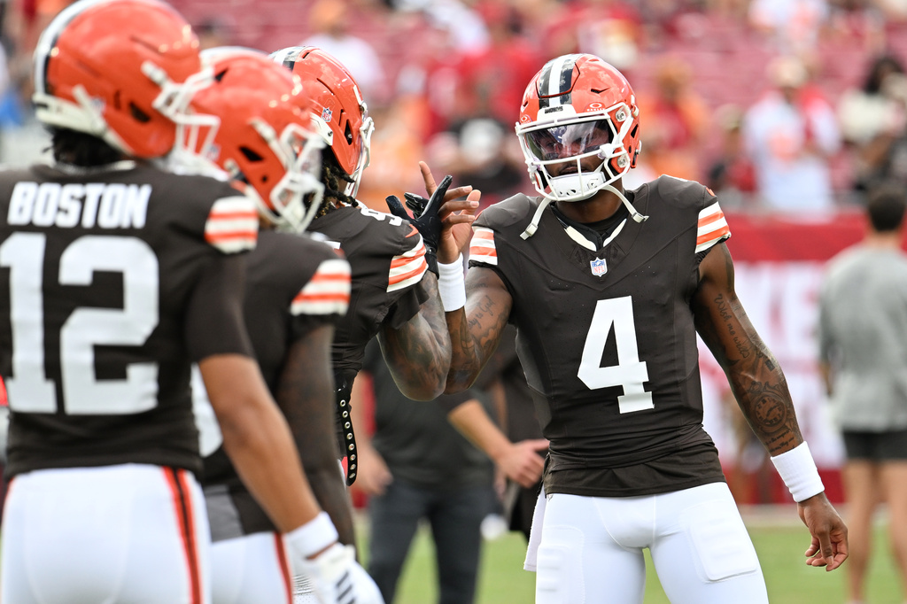 Cleveland Browns quarterback Deshaun Watson (4) greets his teammates before an NFL football game against the Tampa Bay Buccaneers in Tampa, Fla., Sunday, Sept. 20, 2026. (AP Photo/Jason Behnken)