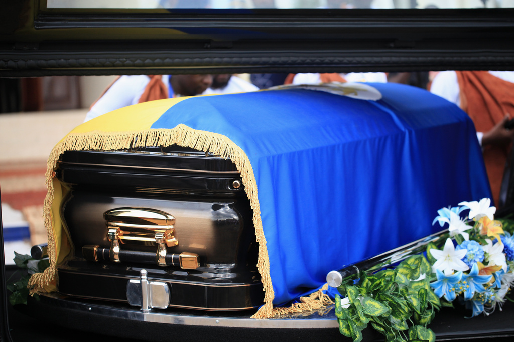 The casket of Tooro's King Oyo Nyimba is loaded into a hearse in the remote city of Fort Portal, near the Congo border in Uganda, Saturday, Sept. 12, 2026. (AP Photo/Patrick Onen)