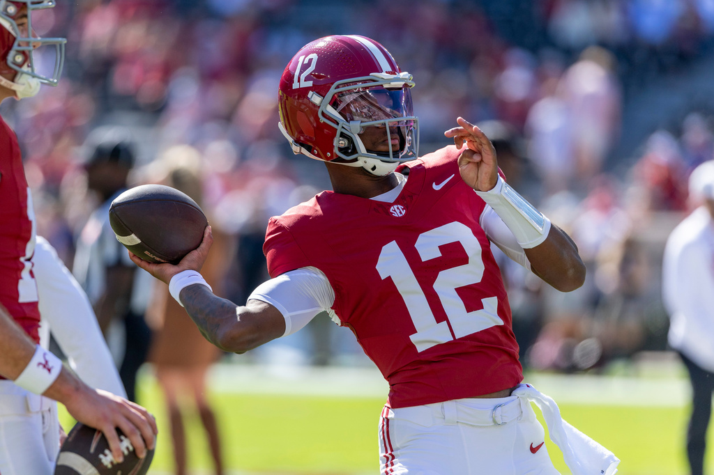 Alabama quarterback Keelon Russell (12) warms up before an NCAA college football game against Texas A&M, Saturday, Oct. 24, 2026, in Tuscaloosa, Ala. (AP Photo/Vasha Hunt)