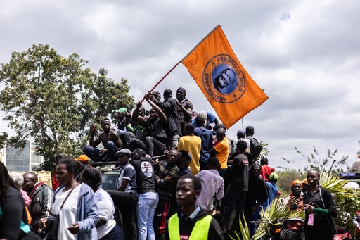 Mourners gather for the arrival of the body of Kenya's former Prime Minister Raila Odinga arrives in Nairobi, Kenya, a day after he died in India, Thursday, Oct. 16, 2025. (AP Photo/Samson Otieno) Mourners gather for the arrival of the body of Kenya's former Prime Minister Raila Odinga arrives in Nairobi, Kenya, a day after he died in India, Thursday, Oct. 16, 2025. (AP Photo/Samson Otieno)