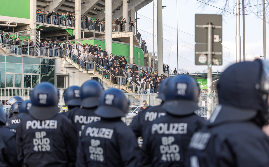 Bremen's supporters stay outside the stadium before the German Bundesliga soccer match between VfL Wolfsburg and SV Werder Bremen in Wolfsburg, Germany, Saturday, March 21, 2026. (Andreas Gora/dpa via AP)
