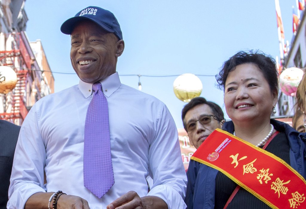 FILE - This photo provided by the New York Mayoral Photography Office shows New York Mayor Eric Adams as he delivers remarks and marches in the 21st Autumn Moon Festival and 12th China Day Festival with Winnie Greco, right, Oct. 1, 2023, in New York. (Violet Mendelsund/New York Mayoral Photography Office via AP, File)